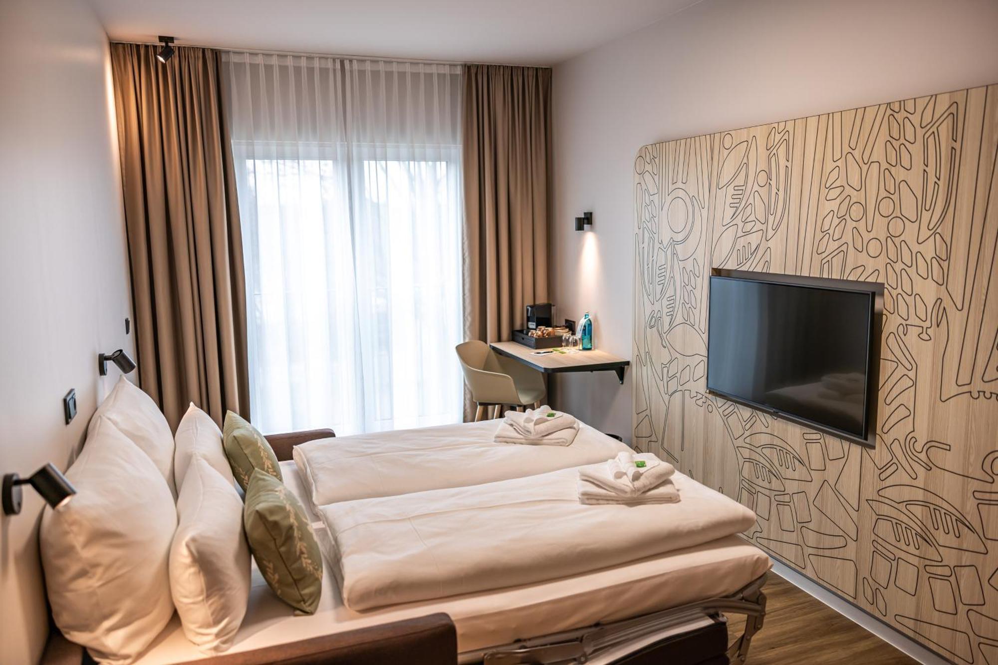 Platzhirsch Living Hotel Kelsterbach Bagian luar foto