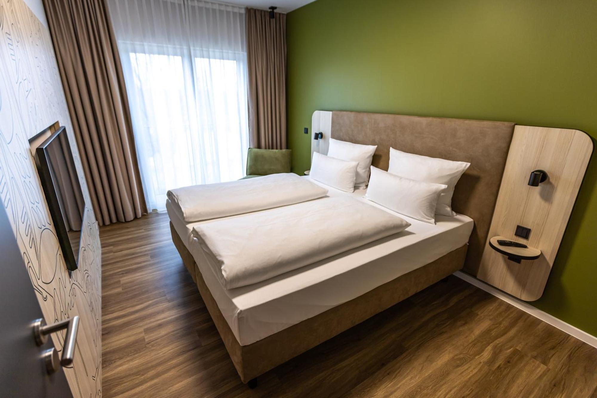 Platzhirsch Living Hotel Kelsterbach Bagian luar foto