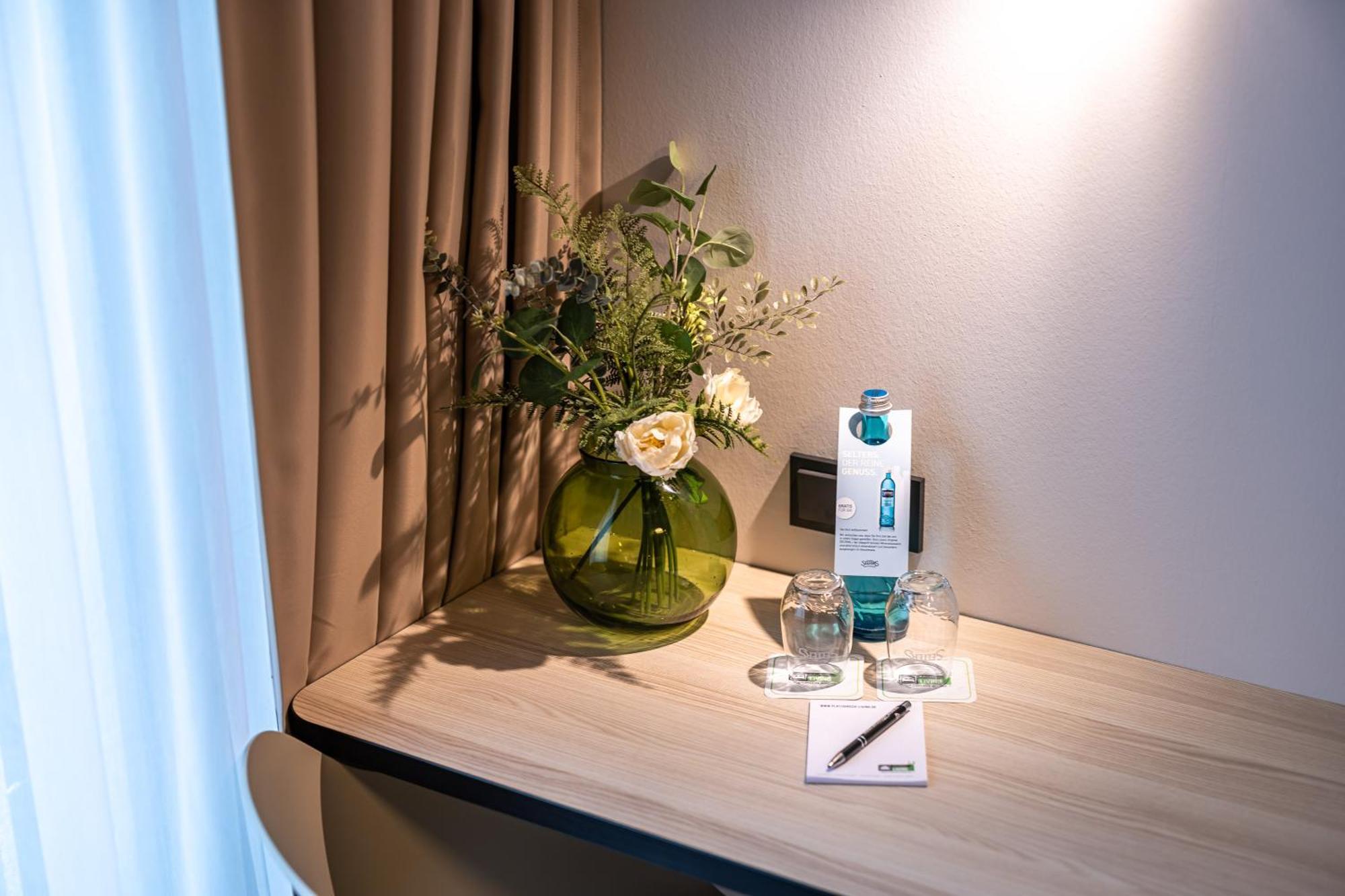 Platzhirsch Living Hotel Kelsterbach Bagian luar foto